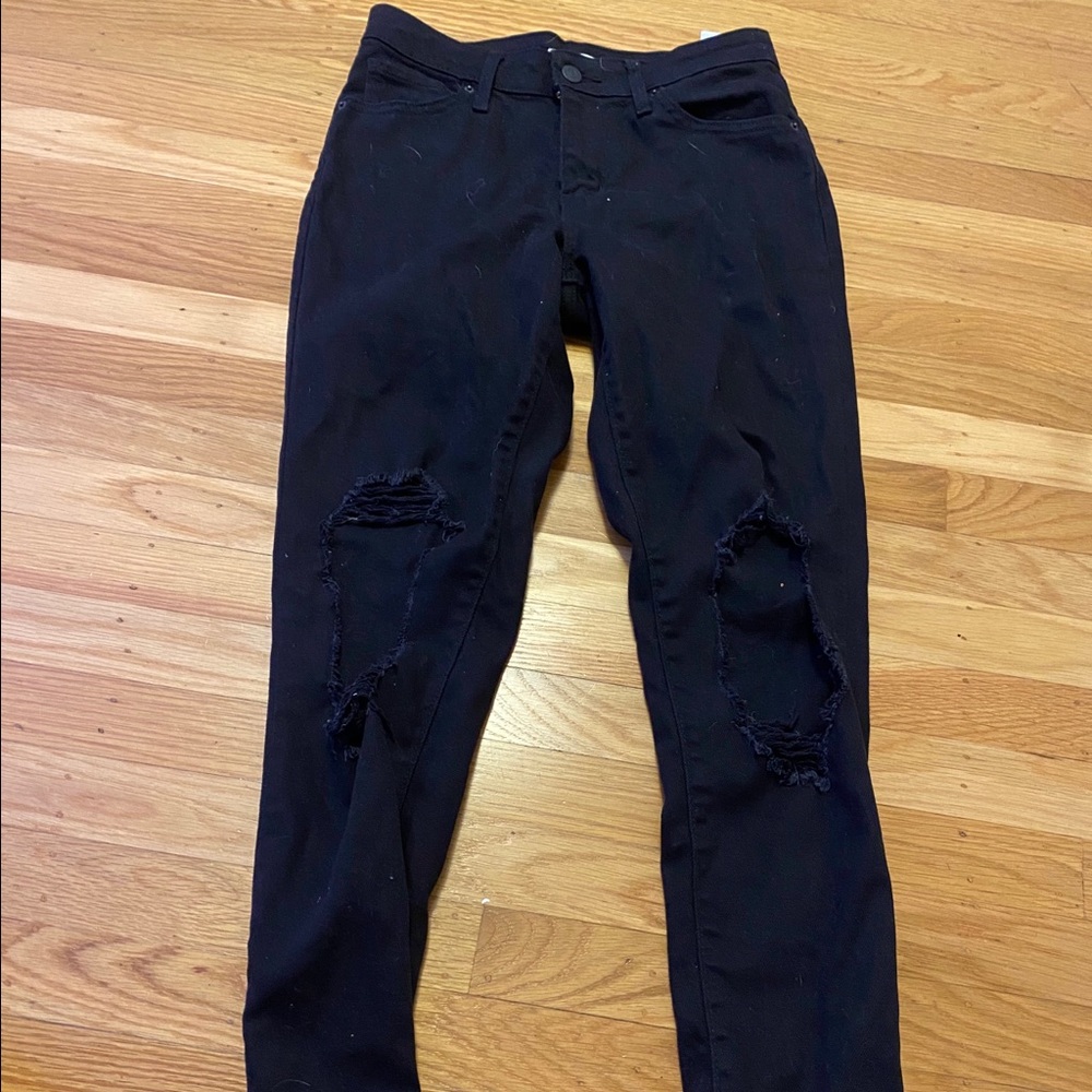black ripped jeans